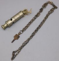 The Metropolitan Patent Manchester City Police whistle, and a pocket watch key for Arthur Kay,