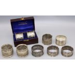 Group of nine variously hallmarked C20th silver napkin rings, incl. a set of two cased napkin