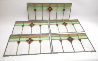 Four 1930's leaded glass panels 31cm x 56.5cm and another 75cm x 31.5cm