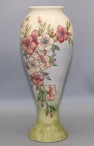 Moorcroft Pottery: Spring Blossom pattern vase of inverted baluster form, tube lined decoration of