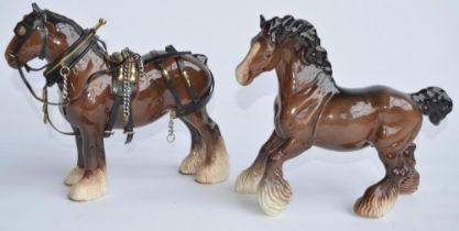 Two Beswick Shire horses in undamaged condition, one with wagon tack