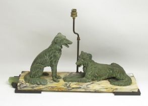Art Deco style slate and variegated marble table lamp mounted with two patinated spelter dogs,