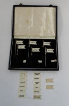 Cased set of hallmarked silver sandwich flags, Birmingham 1929, consisting of 6 flagpoles and 20
