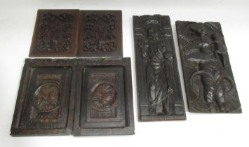 Pair of Flemish Late c17th panels, pair of earlier oak panels showing and woman's & mans head,