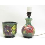 Moorcroft Pottery- Clematis pattern cache pot, H12.5cm and a Hibiscus pattern lamp, H25.5cm (2)