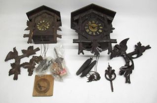 Early C20th Black Forest cuckoo clock with carved eagle pediment and twin weight driven movement