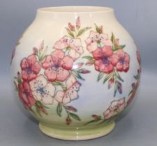 Moorcroft Pottery: Spring Blossom pattern globular form vase, tube lined decoration of pink