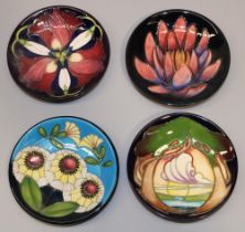 Moorcroft Pottery: four pin dishes/coasters designed and signed by Emma Bossons - 'New Dawn' dated