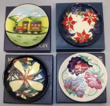 Moorcroft Pottery: four MCC Moorcroft Collectors Club pin dishes/coasters - 'Panache' designed by