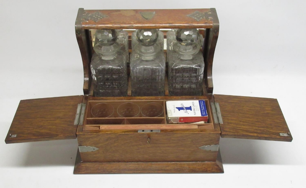 Early C20th three decanter oak tantalus with plated mounts and games compartment W38cm - Image 2 of 2