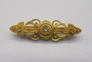 15ct yellow gold Edwardian bar brooch set with single diamond, stamped 15ct, 3.5g