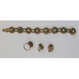 Hallmarked 9ct gold bracelet with matching earrings and ring, the shaped flower head mounts set with