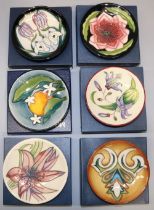 Moorcroft Pottery: six trial pin dishes/coasters - orange with orange blossom on green ground, dated