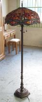 Edwardian style patinated metal three light floor lamp with large Tiffany style lamp shade