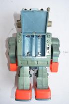 Vintage 1980's Kamco plastic battery operated rocket firing Saturn robot in blue plastic with stop/