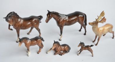 Collection of 6 Beswick ceramic animal figurines to include a stag and 5 horses, all with repaired