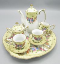 German miniature coffee set comprising tray, coffee pot, milk/cream jug, sugar bowl and 2 cups