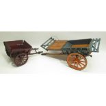 Small painted wood model of a cart H27cm and another small wood model of a cart H19cm (2)