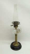 National Lamp Works - late C19th paraffin lamp with faceted clear reservoir on fluted column H66cm