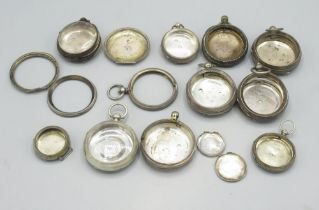 Nine silver pocket watch cases and other silver watch case parts gross weight 14.24 ozt