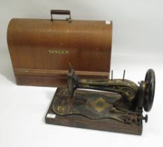 Singer hand sewing machine in oak case (key a.f.) and a Jones treadle sewing machine (2)