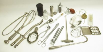 Collection of medical and surgical instruments inc. scalpels, cased syringe set, forceps, etc.