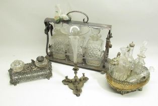 Silver plate tantalus with 3 glass decanters, silver plate desk inkwell and 2 other silver plated