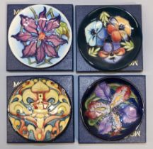 Moorcroft Pottery: four MCC Moorcroft Collectors Club pin dishes/coasters - 'Regency Crown', open