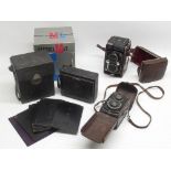 Boxed Yashica-Mat LM camera no. MTL 2050401, Franke & Heidecke Rollieflex camera no. 136556 and an