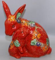 Anita Harris Art Pottery - rabbit and bunny figure, red glaze with floral decoration, H25cm,