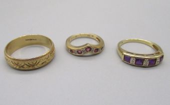 9ct yellow gold ring set with purple and clear stones, another similar set with red and clear