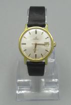 Omega Geneve gold plated wristwatch with date, signed silvered dial with applied baton hours and