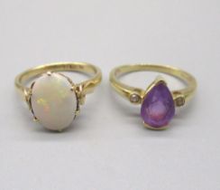 14ct yellow gold ring set with opal, stamped 14k, and a 14ct yellow gold ring set with pear cut