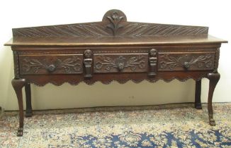 C18th and later oak dresser, galleried back and three drawers relief carved with flowers, on sabre