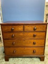 George 1V mahogany chest of two short and three long drawers with turned wood handles on bracket