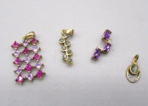 four 9ct gold pendants set with coloured gemstones including garnet, amethyst, diamond etc. all