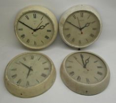 Four Smiths Sectric electric wall clocks retailed by Eastern Watch, Bombay in painted metal cases