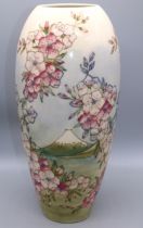 Moorcroft Pottery: Spring Blossom pattern tall vase, tube lined decoration of pink flowers on