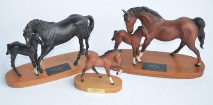 Three base mounted ceramic horse figurines to include Beswick Springtime, Spirit Of Affection and