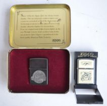 Zippo 60th Anniversary and Scrimshaw Dolphins Zippo lighters in excellent little used condition with