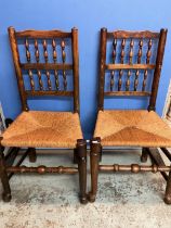 Set of six elm bobbin back rush seat dining chairs, on turned supports with stretchers and pad feet,