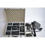 Collection of 35mm film cameras and accessories to include an Olympus OM10 SLR with Olympus 28mm,