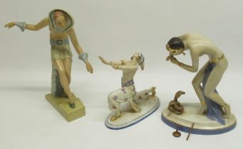 Royal Dux model of an erotic female snake charmer (flute a/f but still present), H21cm and 2 other