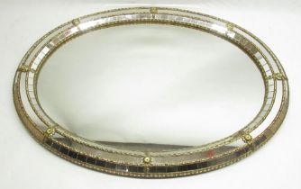 Oval mirror with brass work segmented frame, W79cm x H60cm