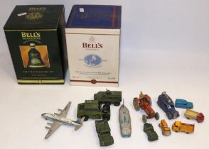 Collection of die-cast vehicles incl. Dinky, Matchbox, and Lesney; and two Bell's bell shaped whisky