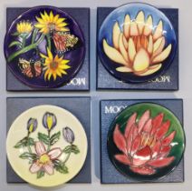 Moorcroft Pottery: four MCC Moorcroft Collectors Club pin dishes/coasters - pink pond lily on