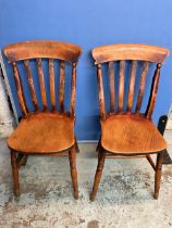 Set of four Victorian beech and elm slat back kitchen chairs on turned supports, stamped R.D and a