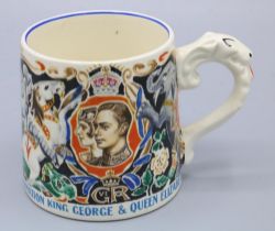 Commemorative mug designed by Laura Knight to celebrate the 1937 coronation of King George and Queen