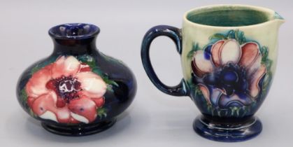 Moorcroft Pottery, anemone pattern - squat vase, H7cm, and a jug, H8cm (2)