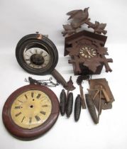 C20th Black Forest cuckoo clock with triple weight driven movement and an early C20th continental